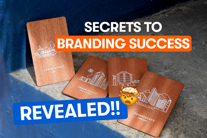 4 digital name cards laying on concrete