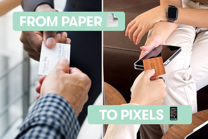 Two people exchanging business cards