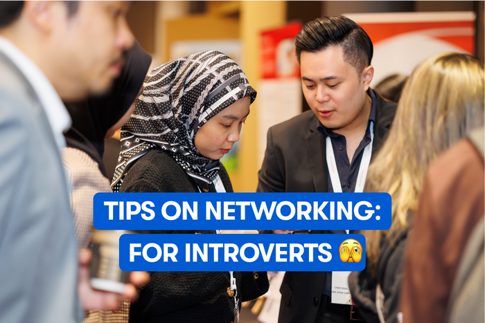 A group of business people networking at an event