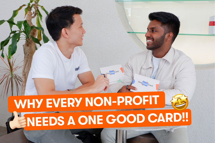 Two men holding their digital business card