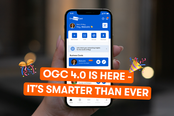 A hand holding a phone with One Good Card interface