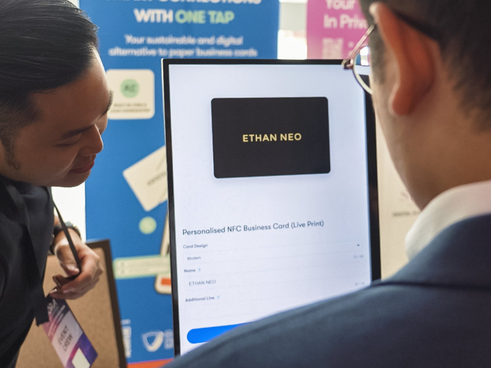 Personalised NFC business card being printed live at an event