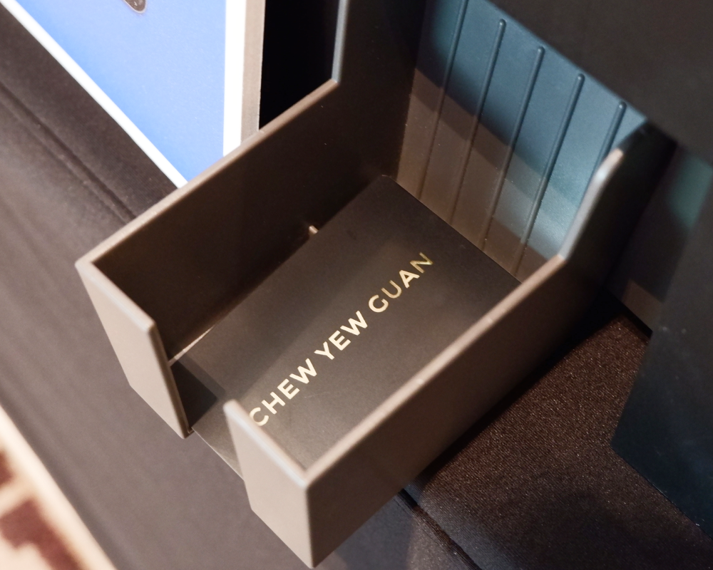 Personalised NFC business cards printed live and packaged for event attendees