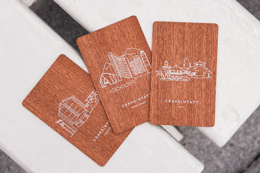 Wooden NFC business cards custom printed with company branding and artwork