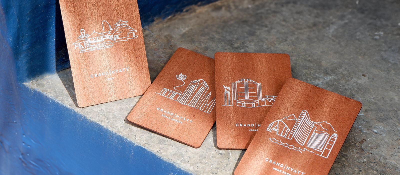 Collection of personalised wooden NFC business cards for sustainable corporate gifting